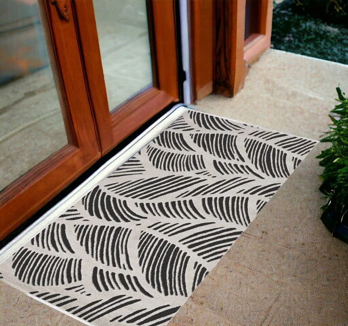 carpet for versatile room options-2' X 4' Machine Woven UV Treated Tropical Palm Leaves Indoor / Outdoor Accent Rug - Black White