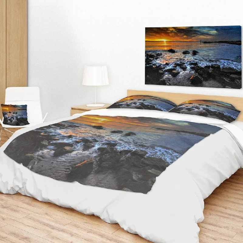 Black throw blanket-Designart 'Sunset over Rocky Ocean Shore' Landscape Fleece Throw Blanket